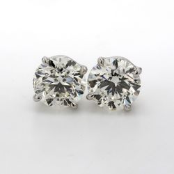 Screw back stud earrings with 4prong set USA certified  I-J/SI2  round diamonds.  D4.01ct.t.w.