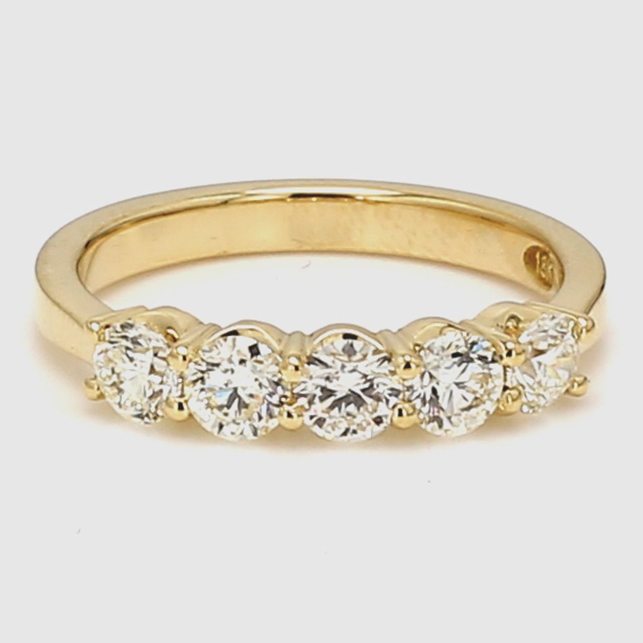 5-stone band in 18K YG with prong set round diamonds.  D0.93ct.t.w.  Size 6