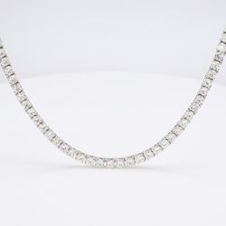 20' Tennis necklace with prong set round diamonds.  D13.70ct.t.w.