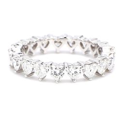 Eternity band in platinum with 3-prong set (19) heart shape diamonds.  D2.25ct.t.w.  Size 6