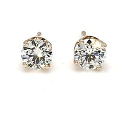Push back stud earrings in yellow gold with 4-prong basket set round diamonds.  D1.02ct.t.w.