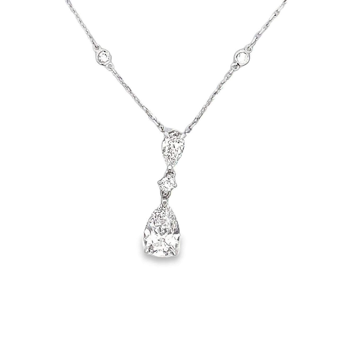 18' Diamonds by the yard drop necklace in 18K WG with bezel set (10) rounds and drop set GIA certified D/SI2-I1 pear shape diamonds.   D2.96ct.t.w.