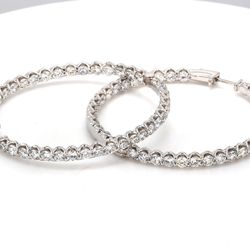 1.80' Inside out hoop earrings with U-prong set (76) round diamonds.  D7.98ct.t.w.