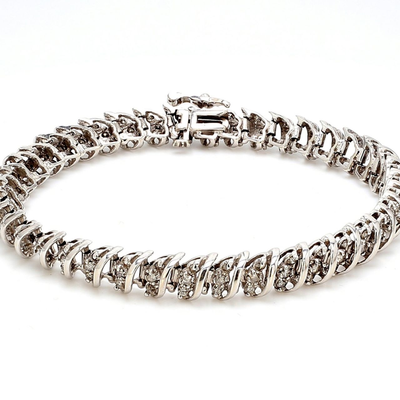 7.5' Bracelet S-style in 10K WG with prong set round diamonds.  D2.00ct.t.w.