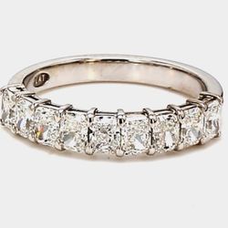 9-stone band in platinum with basket prong set radiant cut diamonds.  D1.31ct.t.w.  Size 5.75