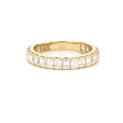 3/4 way band in yellow gold with shared prong set (20) emerald cut diamonds.  D1.69ct.t.w.  Size 5