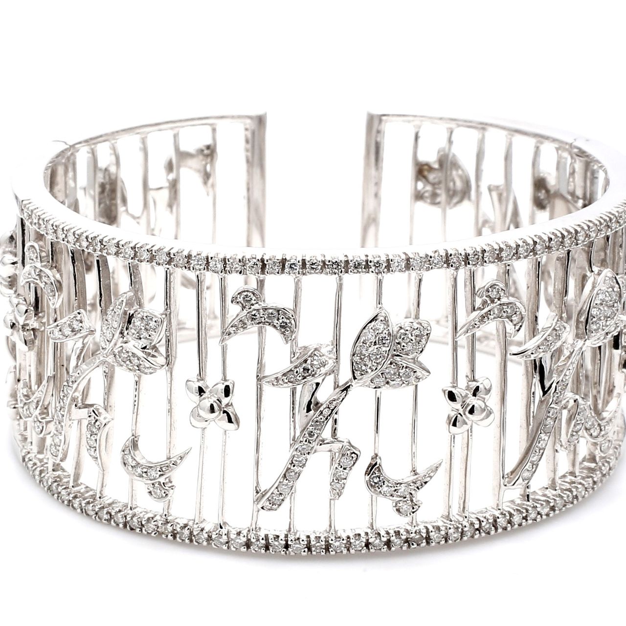 Tulip flower design cuff in 18K WG with round diamonds.  D1.40ct.t.w.