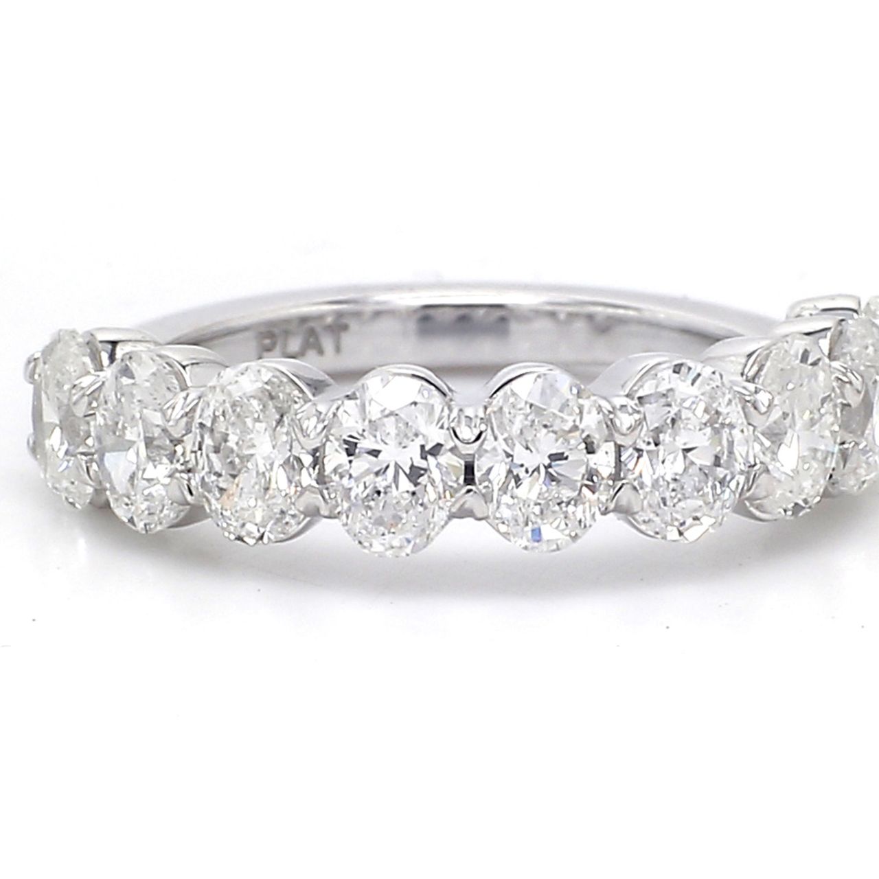 9-stone band in platinum with basket prong set oval cut diamonds.  D2.06ct.t.w.  Size 5.5