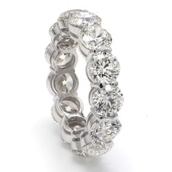 Eternity band in platinum with basket claw prong set G-I/VS2-SI1 (13) round diamonds.  D10.42ct.t.w.  Size 7