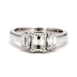 Three-stone semi-mount in platinum with emerald cut diamonds sides.  D0.45ct.t.w.
