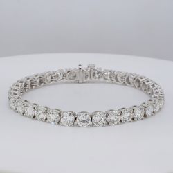 6.75' Tennis bracelet in platinum with 4-prong set GIA certified F-G/SI2 (33) round diamonds.  D16.80ct.t.w.