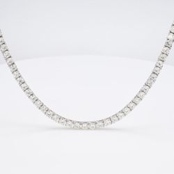 18' Tennis necklace with 4-prong set (182) round diamonds.  D7.92ct.t.w.