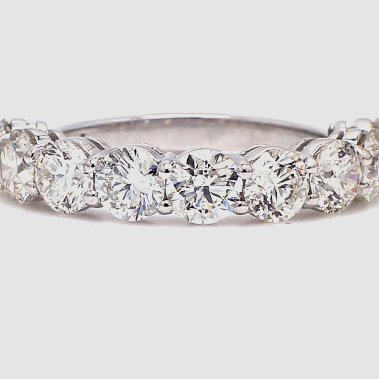 9-stone band in platinum with basket prong set round diamonds.  D2.18ct.t.w.  Size 5