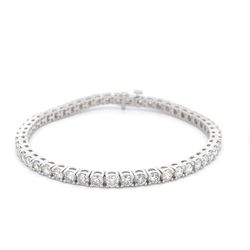 7' Tennis bracelet with basket prong set (73) round diamonds.  D2.83ct.t.w.