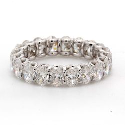 Eternity band in platinum with U-prong set (19) oval diamonds.  D3.73ct.t.w.  Size 5