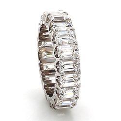 Eternity band in 18K WG with U-prong set (20) emerald cut diamonds.  D4.91ct.t.w.  Size 4.25