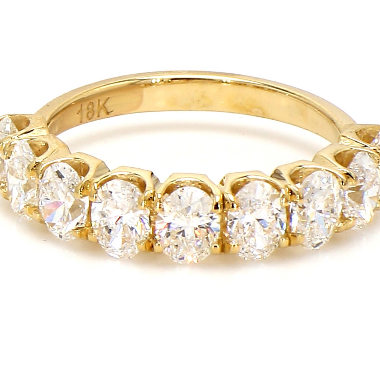 9-stone band in 18K YG with prong set oval cut diamonds.  D2.10ct.t.w.  Size 6.25
