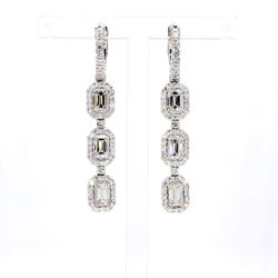 Halo dangling earrings with 4-prong set emerald cuts & round diamonds.  D2.89ct.t.w.