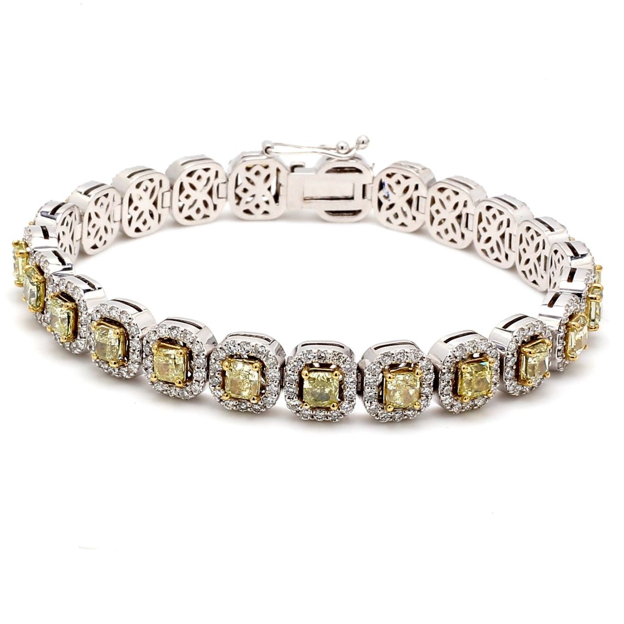 7' Halo tennis bracelet in 18K WG with pre-set rounds around 4-prong set fancy yellow (23) cushion diamond centers.  D10.15ct.t.w.  (Center 6.74ct.t.w.)