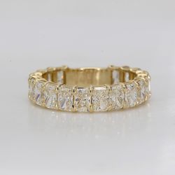 Band in 14K YG with double basket shared prong set (18) radiant diamonds.  D2.63ct.t.w.  Size 4