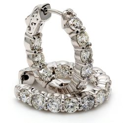 0.75' Oval shaped inside out hoop earrings with shared prong set (20) round diamonds & with special spring lock.  D4.72ct.t.w.