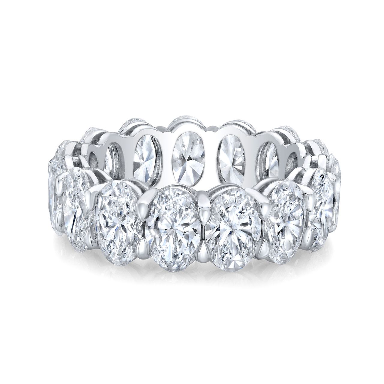 Eternity band in platinum with shared basket prong set (18) oval diamonds.  D4.38ct.t.w.  Size 6.5