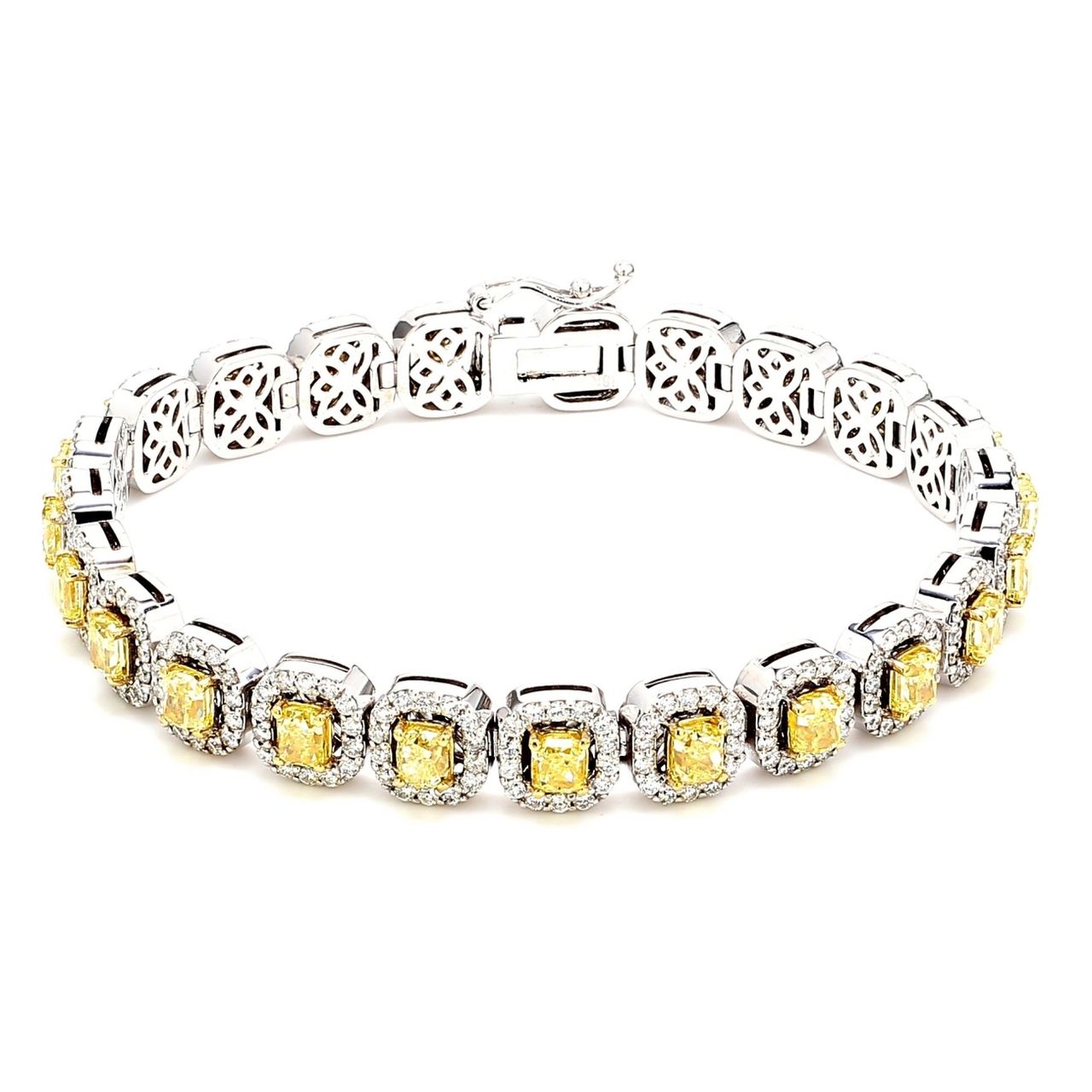 7' Tennis halo bracelet in 18K WG with french pave set rounds around prong set fancy intense yellow cushion cut diamond centers.  D9.94ct.t.w.  Fancy Intense Yellow 7.02ct.t.w.