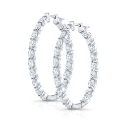 1.5' Oval shape inside out hoop earrings in 18K WG with prong set (38) oval cut diamonds.  D8.96ct.t.w.