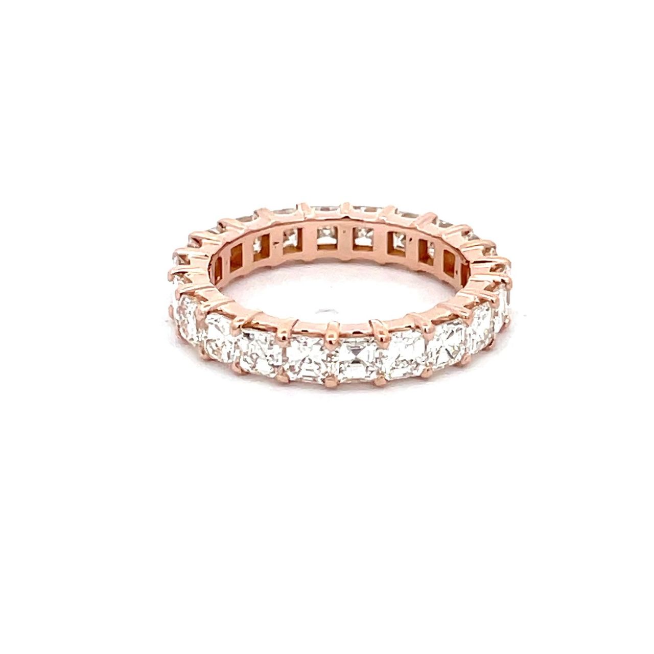 Eternity band in 18K RG with shared prong single basket set (22) asscher cut diamonds.  D3.07ct.t.w.  Size 5.5