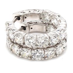 0.75' Inside out hoop earrings with basket prong set (20) round diamonds.  D4.24ct.t.w.
