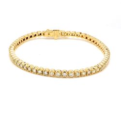 7' Tennis bracelet in 14K YG with 4-prong set (51) round diamonds.  D7.40ct.t.w.