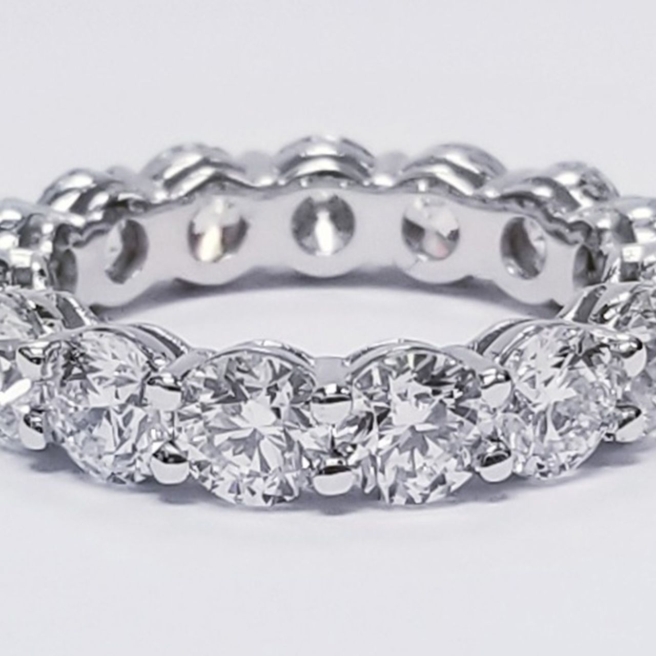 Eternity band in platinum with shared prong set (15) round diamonds.  D5.19ct.t.w.  Size 7.25
