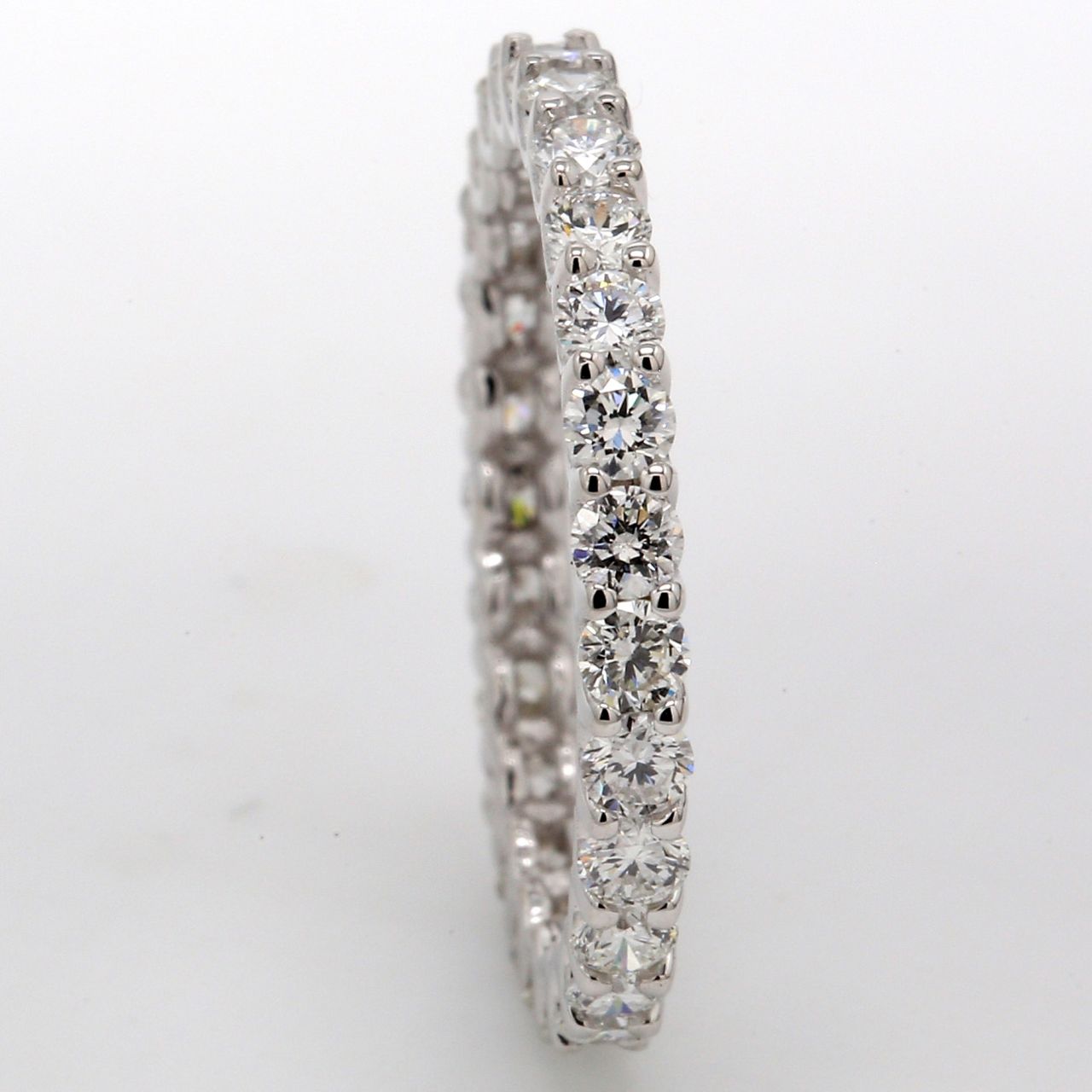 Eternity band in 18K WG with U-prong set (27) round diamonds.  D1.19ct.t.w.  Size 5.75