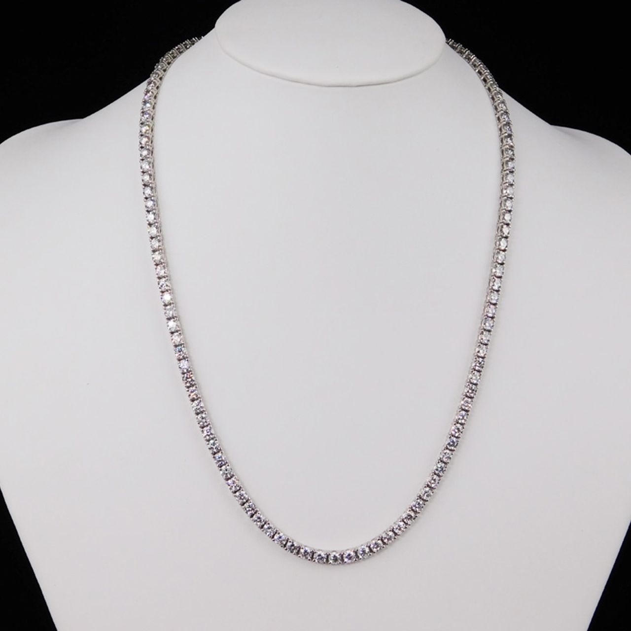 16' Tennis necklace with 4-prong set (95) round diamonds.  D24.22ct.t.w.