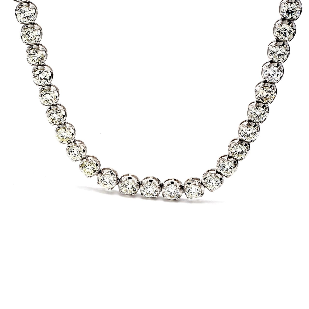 19' Tennis necklace in 18K WG with crown head prong set (83) round diamonds.  D23.62ct.t.w.