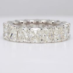 Eternity band in platinum with U-prong set G-H/VVS-VS (17) radiant cut diamonds.  D12.78ct.t.w.  Size 8.25