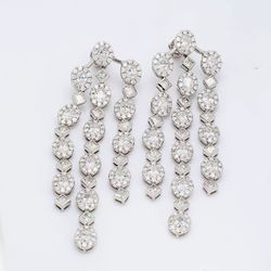 2.5' Chandelier earrings in 18K WG with 3-line alternating halo ovals & bezel set princess cut diamonds.  D10.83ct.t.w.