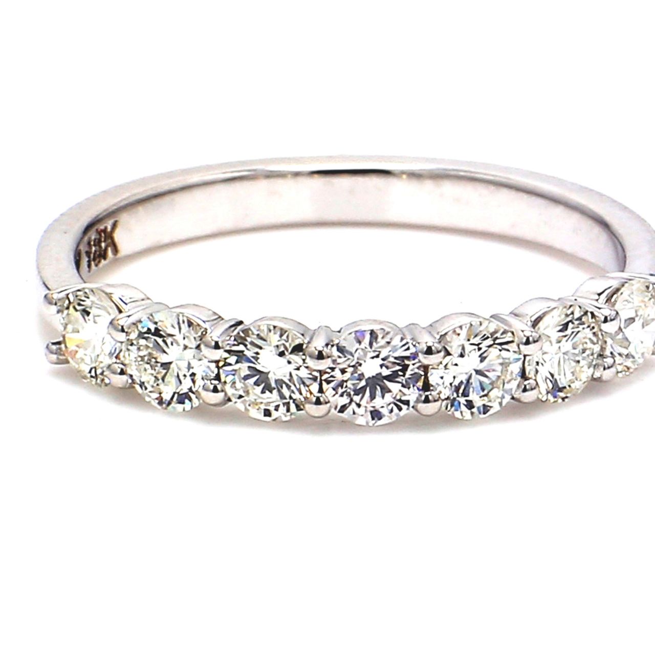 7-stone band in 18K WG with prong set round diamonds.  D0.84ct.t.w.  Size 7
