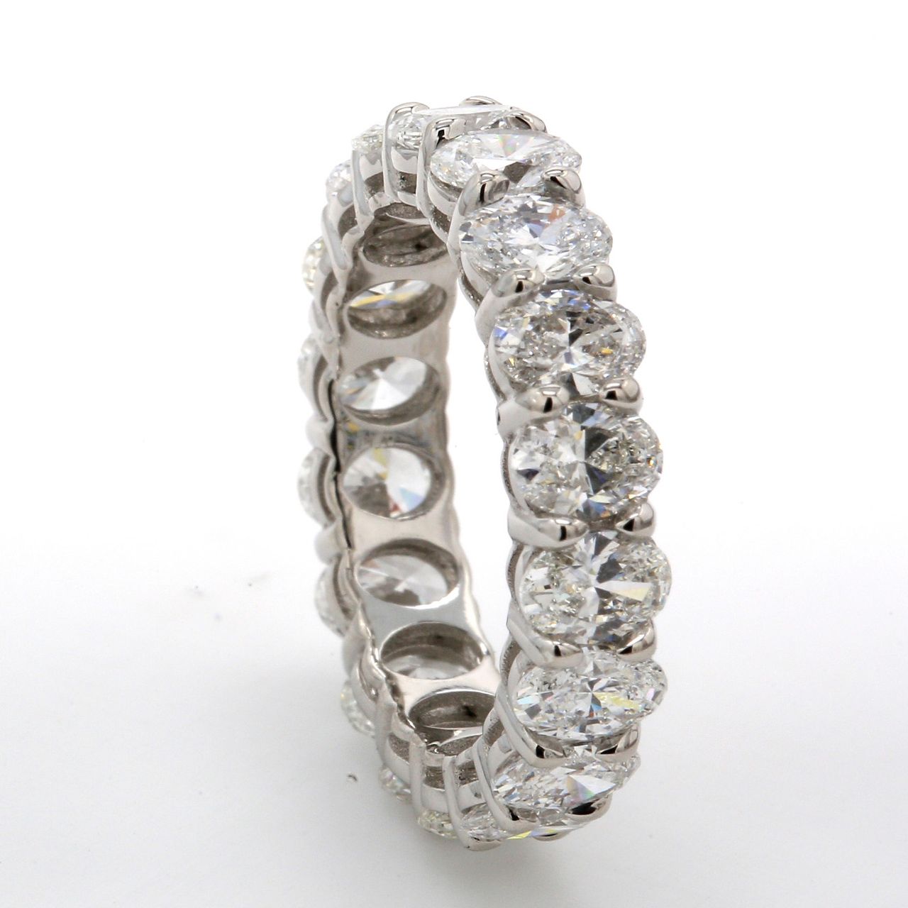Eternity band in platinum with prong set (18) oval cut diamonds.  D3.55ct.t.w.  Size 5
