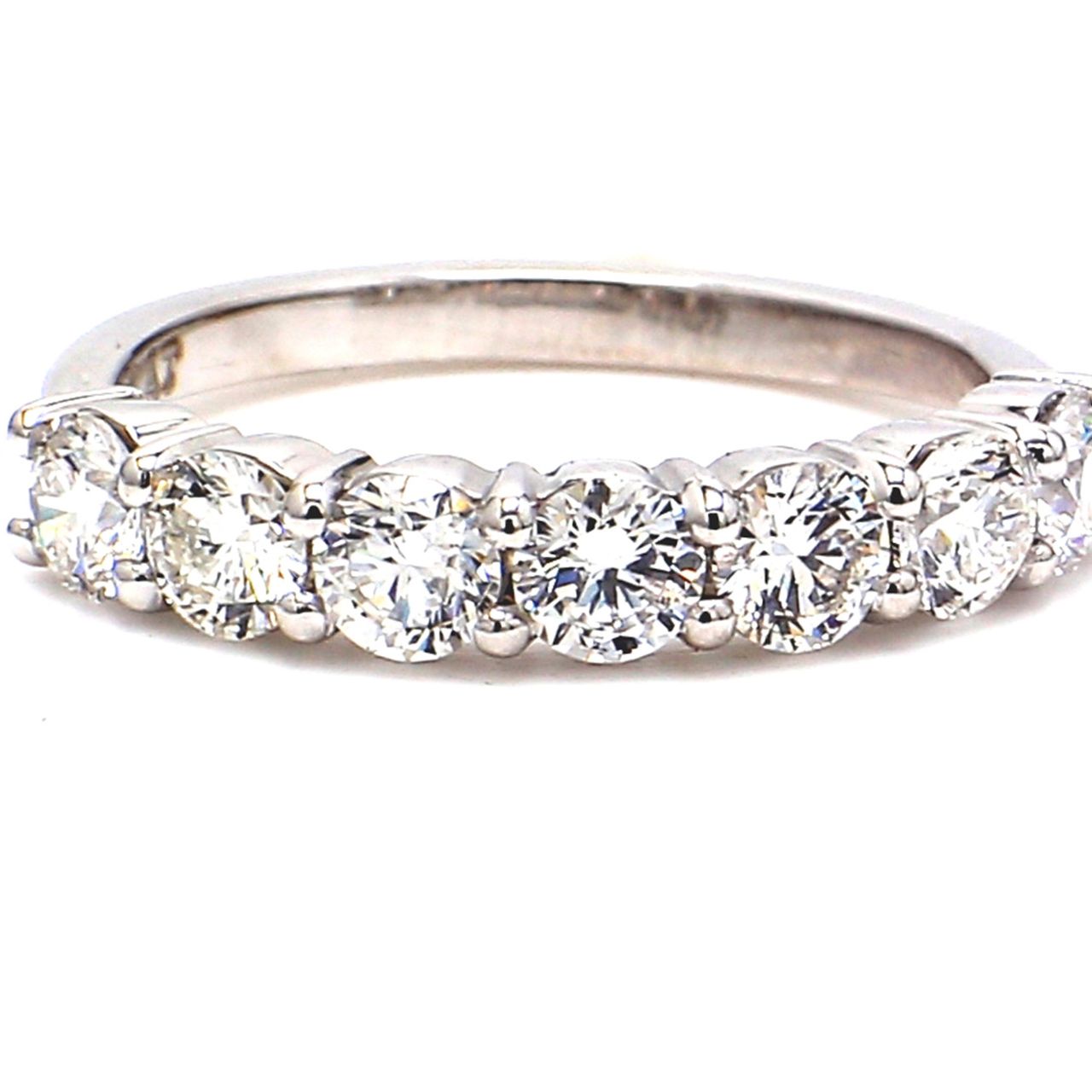 7-stone band in platinum with prong set round diamonds.  D1.00ct.t.w.  Size 5