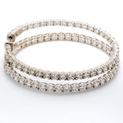 2' Inside out hoop earrings with 4-prong set (78) round diamonds and special spring lock.  D7.04ct.t.w.