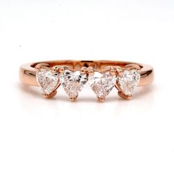 Band in rose gold with 4-prong set heart shape diamonds.  D1.02ct.t.w.  Size 7