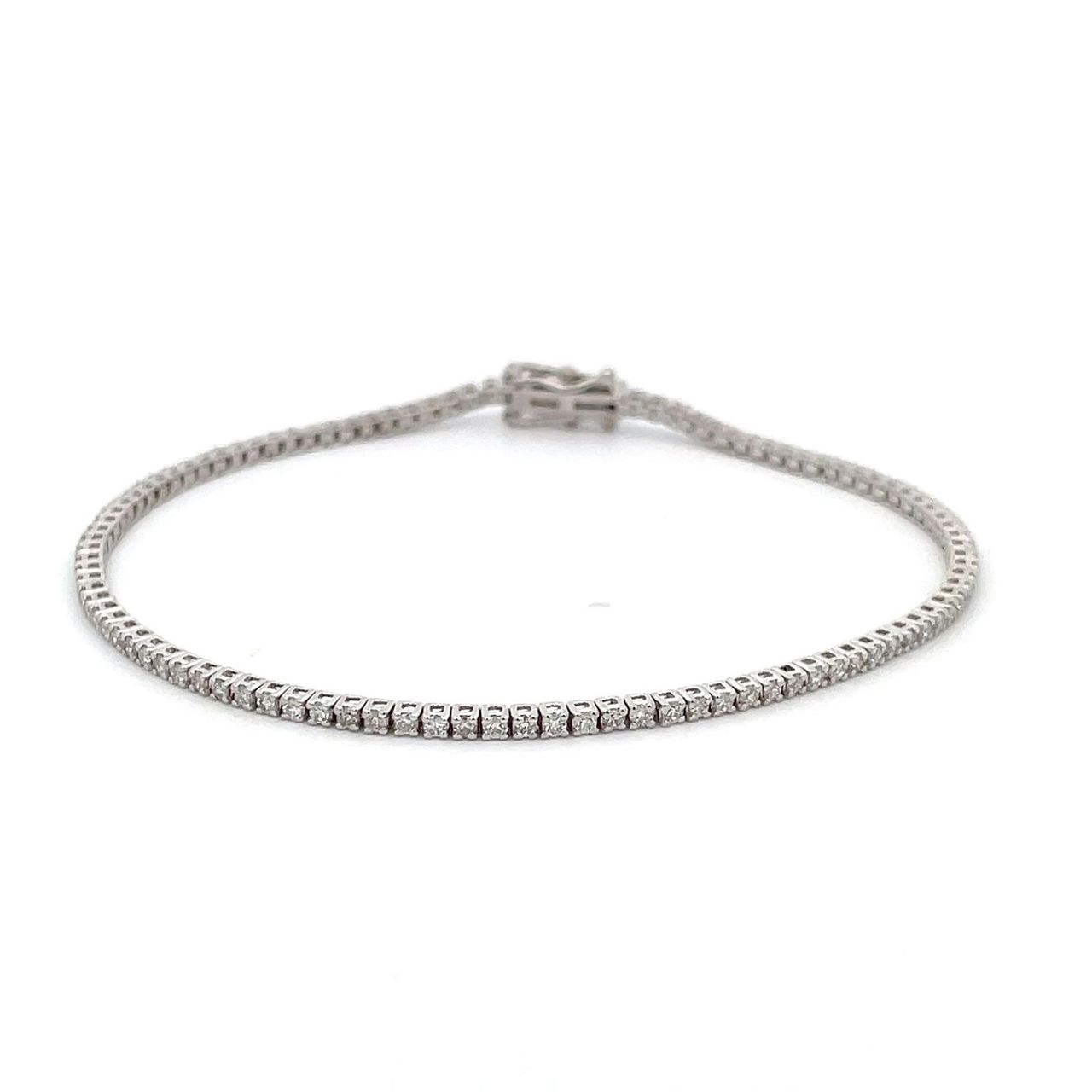 7' Tennis bracelet with basket prong set (103) round diamonds.  D1.12ct.t.w.