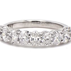 9-stone band in platinum with prong set oval cut diamonds.  D1.69ct.t.w.  Size 7