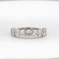 9-stone band in platinum with shared prong basket set oval diamonds.  D2.27ct.t.w.  Size 6