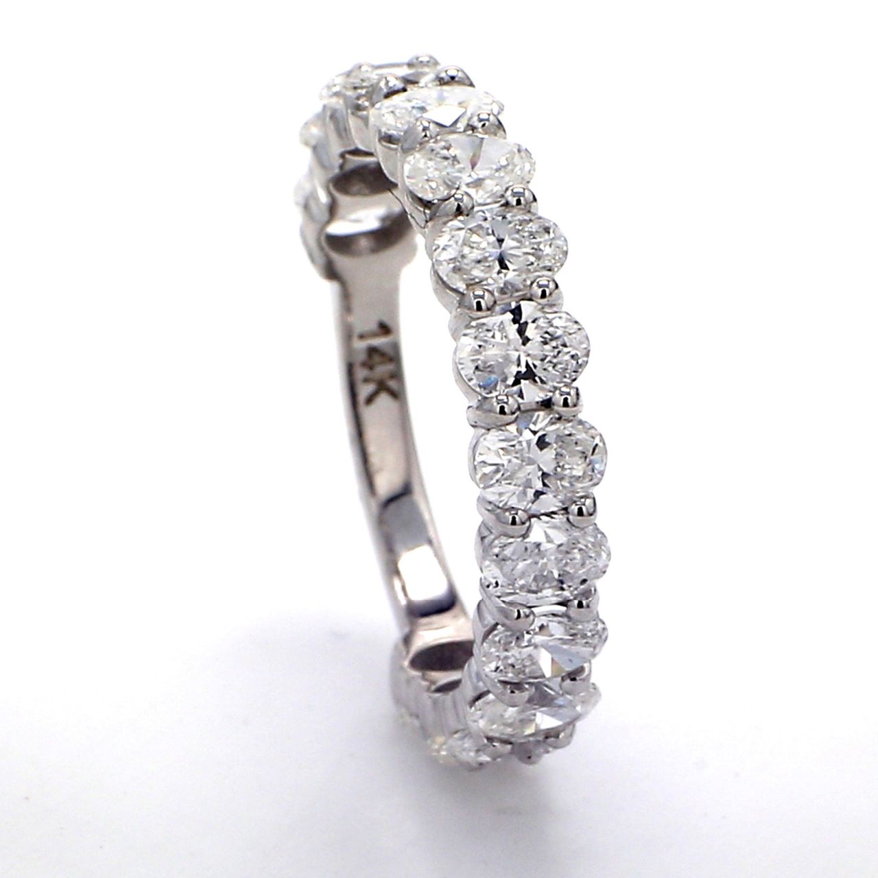 3/4 way band with basket prong set (15) oval cut diamonds.  D2.06ct.t.w.  Size 5.25