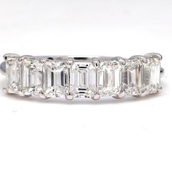 7-stone band in platinum with prong set emerald cut diamonds.  D1.82ct.t.w.  Size 6.75