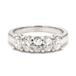 5-stone band with shared prong set oval diamonds.  D1.16ct.t.w.  Size 6.5