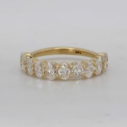 Single row band in 14K YG with prong set (11) oval diamonds.  D1.64ct.t.w.  Size 5