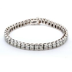 7' Tennis bracelet with round diamonds.  D9.04ct.t.w.
